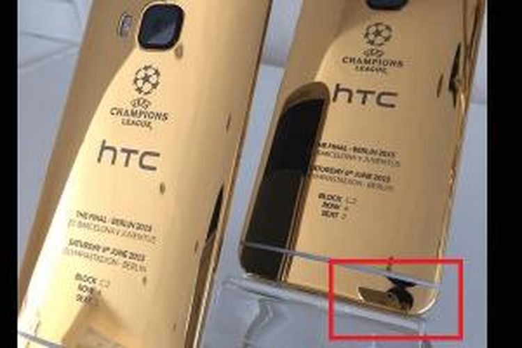 Terlihat bayangan orang menjepret menggunakan iPhone di kanan bawah HTC One M9 edisi spesial ini