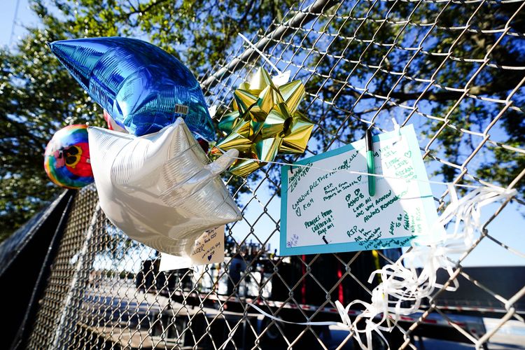 Letters and balloons are seen outside of the canceled Astroworld festival at NRG Park on November 6, 2021 in Houston, Texas. According to authorities, eight people died and 17 people were transported to local hospitals after what they describe as a crowd surge at the Astroworld festival, a music festival started by Houston-native rapper and musician Travis Scott in 2018.   Alex Bierens de Haan/Getty Images/AFP (Photo by Alex Bierens de Haan / GETTY IMAGES NORTH AMERICA / Getty Images via AFP)