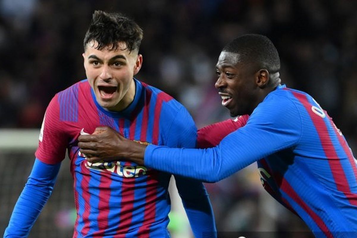 Pedri berselebrasi usai mencetak gol ke gawang Sevilla di Camp Nou pada pekan ke-30 LaLiga, Senin (4/4/2022) dini hari WIB. Terdekat, Pedri bersama Barcelona akan menghadapi rival abadi mereka, Real Madrid. Laga Real Madrid vs Barcelona dijadwalkan berlangsung pada Minggu (24/7/2022) pagi WIB.
