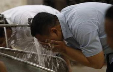 Hukum Kumur Dalam Wudhu