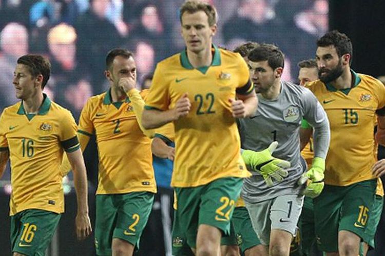 Para pemain Australia bergembira usai menjebol gawang Jerman. 