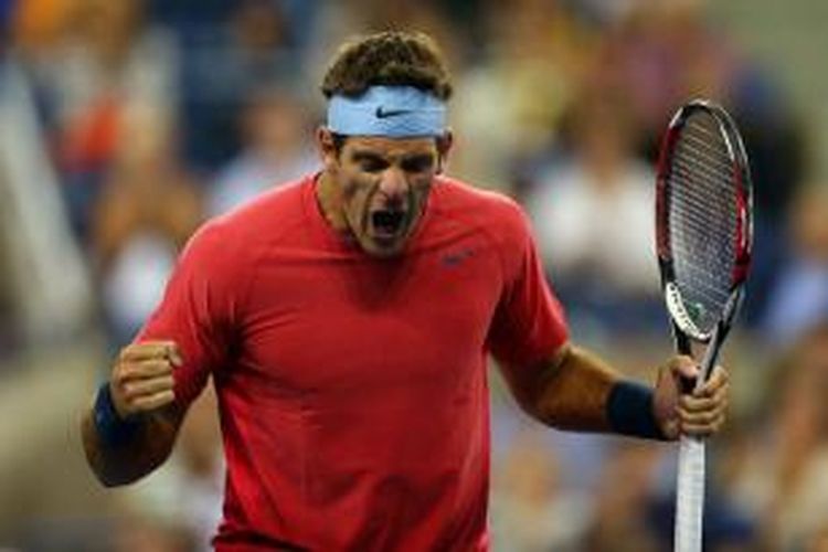 Petenis Argentina, Juan Martin Del Potro, berteriak setelah memastikan kemenangan atas Guillermo Garcia-Lopez dari Spanyol, pada babak pertama US Open yang berlangsung di USTA Billie Jean King National Tennis Center, New York, Rabu (28/8/2013).