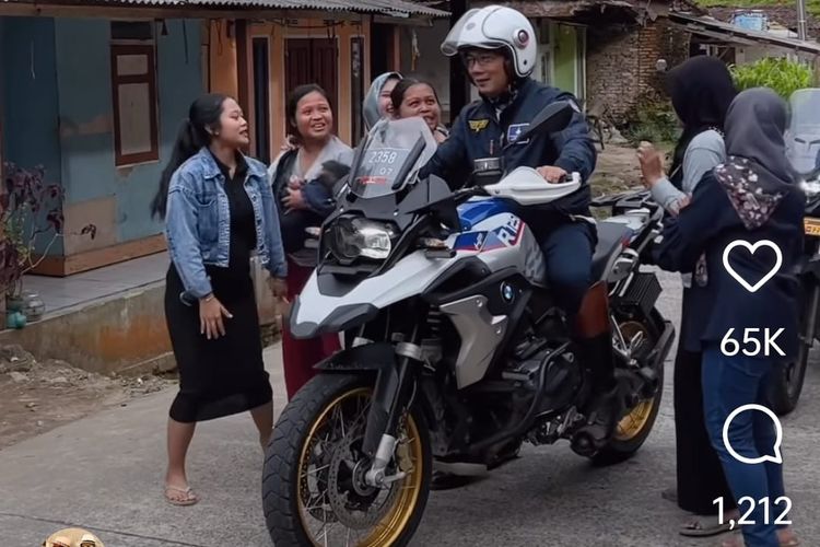 Gaya Gubernur Jawa Barat Ridwan Kamil, melakukan blusukan ke kawasan Cianjur dengan menggunakan motor gede BMW Motorrad.