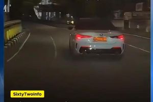 Viral Penumpang BMW Berpelat Dinas Merokok di Dalam Mobil, Kemenhan Buka Suara