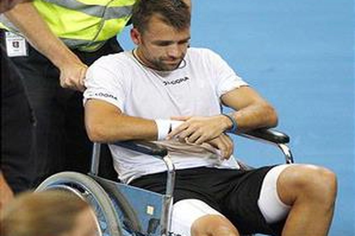 Nicolas Kiefer cedera sehingga tak bisa melanjutkan pertandingan di Piala Hopman.