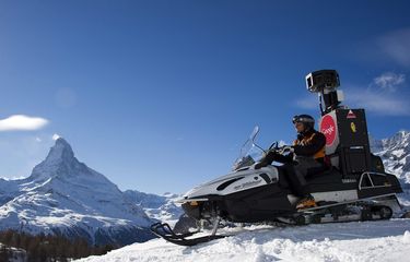 epa02595085 The Google Street View Snow Mobile takes pictures of ski slopes for Googles Street View in front of the Matterhorn mountain in Zermatt, Switzerland, 21 February 2011.  EPA/OLIVIER MAIRE