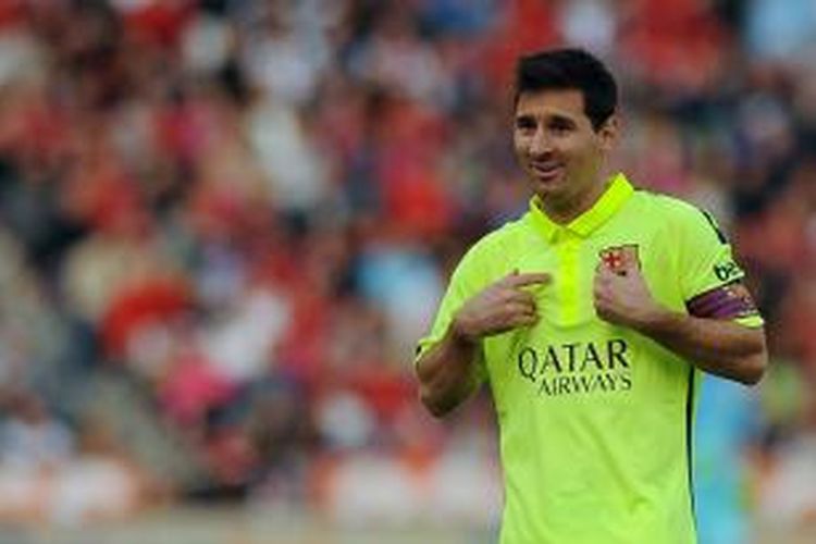 Salah satu ekpresi bintang Barcelona, Lionel Messi, saat melawan Almeria, pada pertandingan lanjutan Primera Division, Sabtu (8/11/2014).