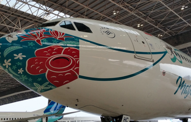 Desain masker Garuda Indonesia.