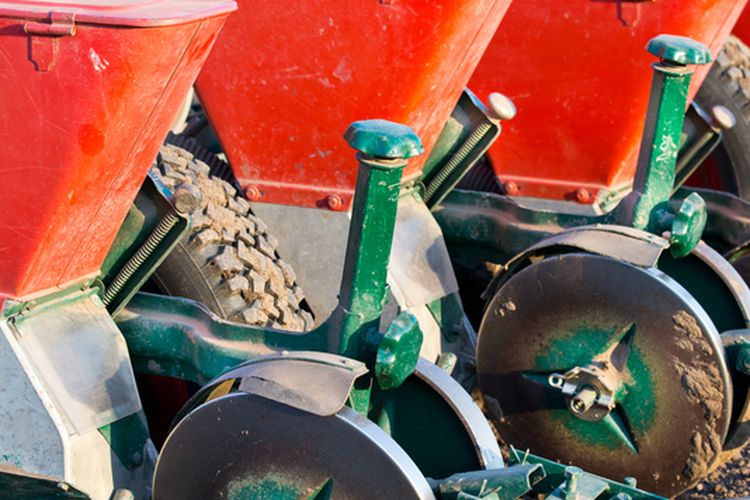 Ilustrasi seed planter, alat yang digunakan untuk menanam benih. 