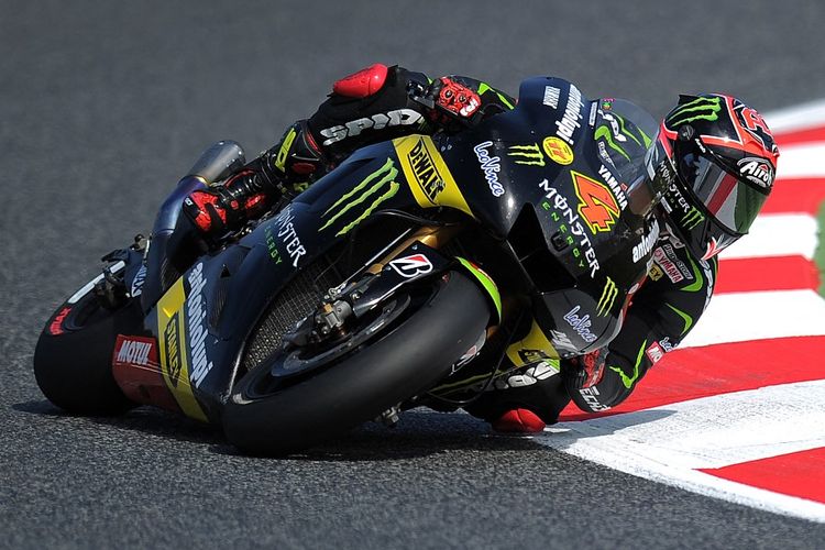 Andrea Dovizioso saat menjadi pebalap tim satelit Monster Tech 3 Yamaha pada 2012 lalu. AFP PHOTO/LLUIS GENE (Photo by LLUIS GENE / AFP)