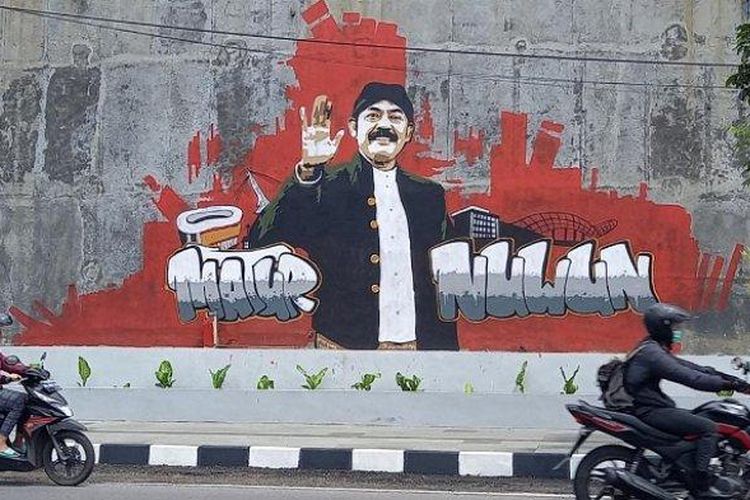 Mural FX Rudy yang dibuat di tembok sepanjang Jalan Juanda, Kelurahan Puncangsawit, Kecamatan Jebres, Kota Solo, Selasa (16/2/2021).  (tribun solo/ ryantono)