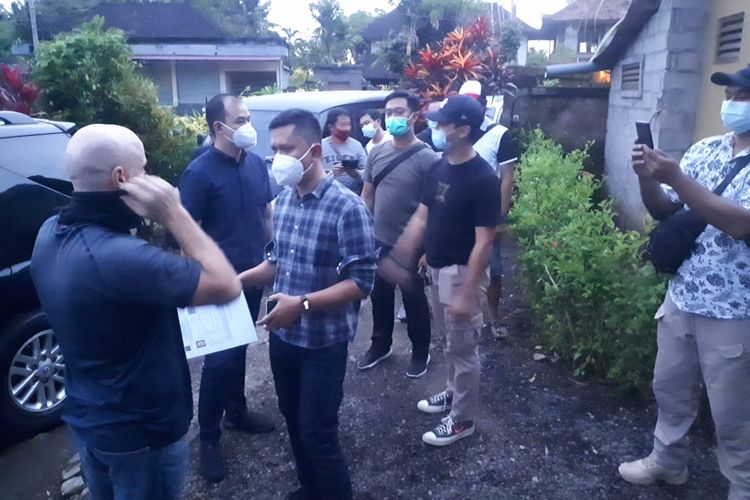 Officials in Bali pick up AB for questioning at the villa where he is staying in Ubud, Gianyar Regency, Bali 