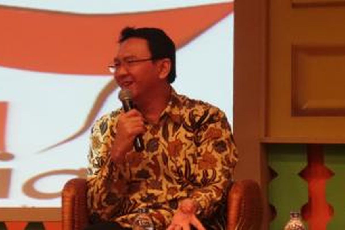 Wakil Gubernur DKI Jakarta Basuki Tjahaja Purnama saat menjadi narasumber di Gedung Astra International, Jakarta, Senin (30/9/2013).