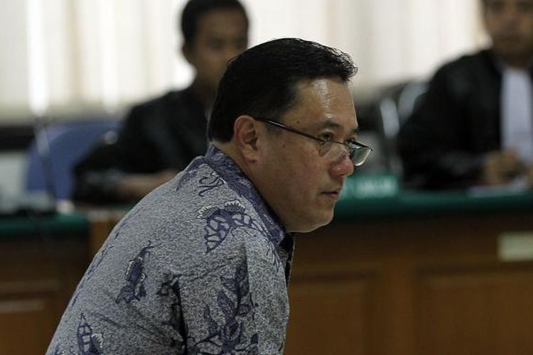 Direktur PT Citra Mandiri Metalindo Abadi Budi Susanto menjalani persidangan dengan agenda pembacaan vonis di Pengadilan Tindak Pidana Korupsi, Jakarta, Kamis (16/1/2014). Budi yang diduga terlibat dalam kasus dugaan korupsi pengadaan alat simulator SIM untuk kendaraan roda dua dan empat di Korlantas Polri tahun 2011, divonis penjara 8 tahun dengan denda Rp 500 juta subsider kurungan 6 bulan, dengan uang pengganti Rp 17,13 miliar subsider kurungan 2 tahun. TRIBUNNEWS/DANY PERMANA 