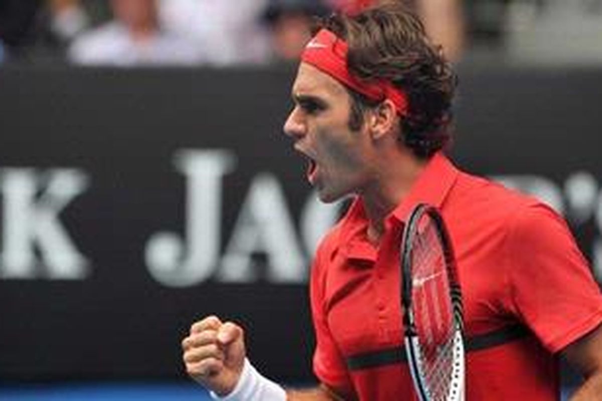 Ekspresi petenis Swiss, Roger Federer, usai kalahkan Ivo Karlovic di babak ketiga Australia Terbuka, Jumat (20/1/12).