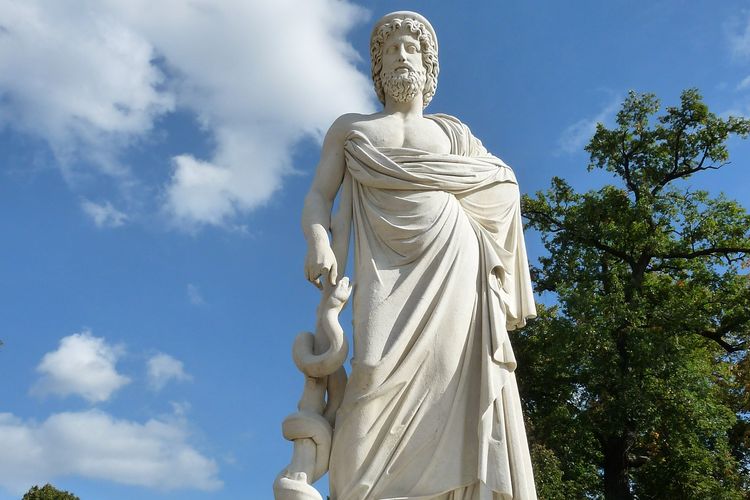 Asclepius adalah dewa kedokteran Yunani. Ia digambarkan dengan tongkat dan ular.