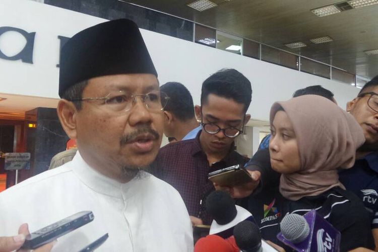 Juru Bicara Hizbut Tahrir Indonesia (HTI) Ismail Yunanto di Kompleks Parlemen, Senayan, Jakarta, Rabu (10/5/2017).