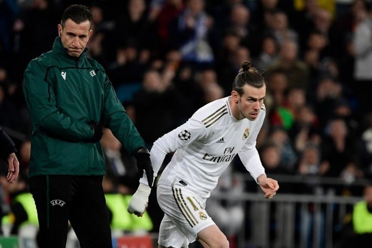 Penyerang Real Madrid, Gareth Bale, masuk ke lapangan pada laga babak 16 besar Liga Champions kontra Manchester City di Stadion Santiago Bernabeu, Kamis (27/2/2020) pagi WIB.