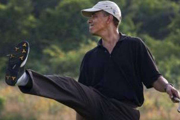Barack Obama bermain golf