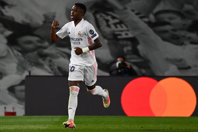 Vinicius Junior merayakan gol ketiga Real Madrid dalam pertandingan Liga Champions antara Real Madrid dan Liverpool di Stadion Alfredo Di Stefano, Selasa (6/4/2021) atau Rabu (7/4/2021) dini hari WIB. 