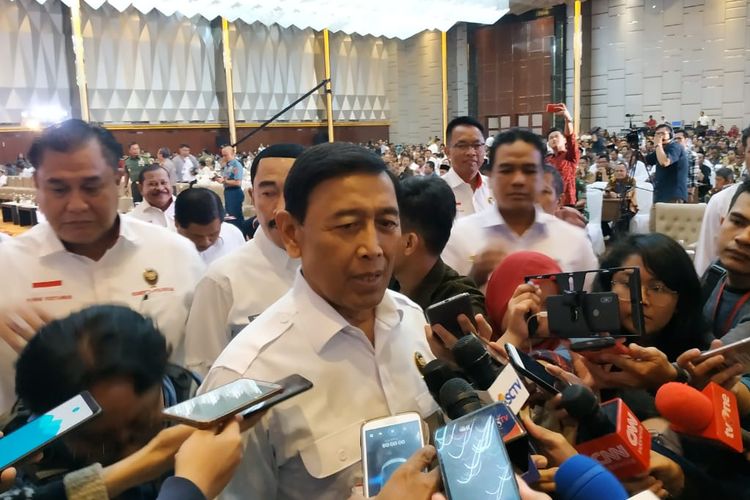 Menteri Koordinator Bidang Politik, Hukum, dan Keamanan (Menko Polhukam) Wiranto saat menghadiri Rapat Koordinasi Nasional (Rakornas) penyelenggaraan Pemilu 2019 di Hotel Grand Paragon, Jakarta, Rabu (27/3/2019).   