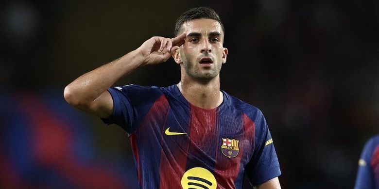 Penyerang Barcelona, Ferran Torres, merayakan gol pada laga Liga Champions antara FC Barcelona dan Paris Saint-Germain (PSG) di Estadi Olimpic Lluis Companys di Barcelona, ??pada 1 Oktober 2025.
