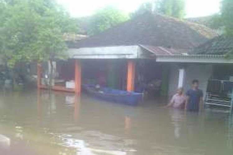 Banjir yang melanda Desa Kedungringin Kecamatan Beji Kabupaten Pasuruan akibat luapan sungai Wrati