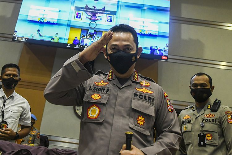 The Criminal Investigation Department (Bareskrim) head, Commissioner General Listyo Sigit Prabowo, gives the hand salute before attending the four-hour fit and proper test at the Parliament building on Wednesday, January 20, 2021. The House of Representatives Commission III overseeing legal affairs approves his nomination as the next Police chief.    