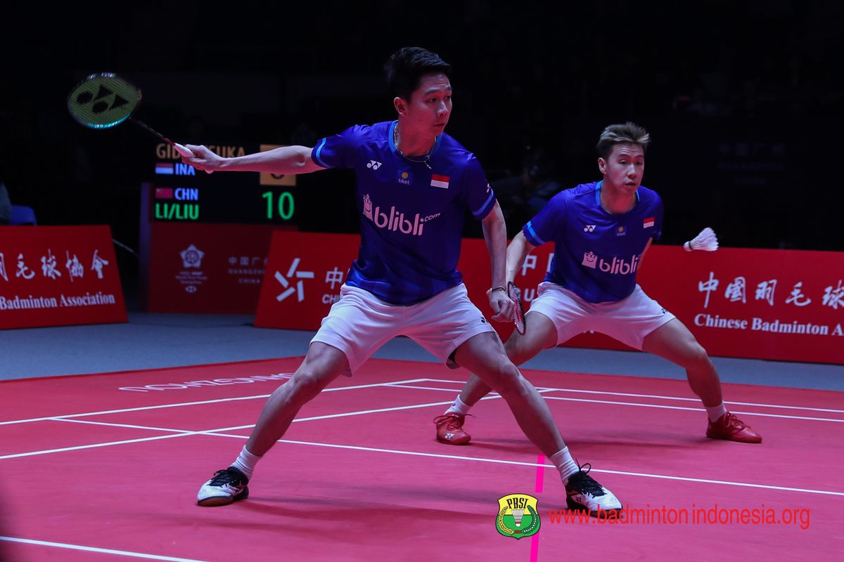 Marcus Fernaldi Gideon/Kevin Sanjaya Sukamuljo saat bertanding di babak penyisihan Grup A BW World Tour Finals 2019 di Tianhe Gymnasium, Guangzhou, Rabu (11/12/2019).