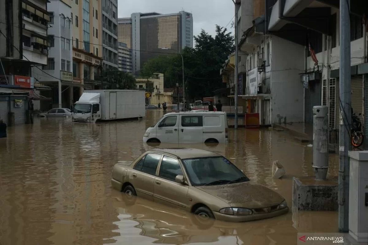 (FILE) An undated image of submerged cars in flood in Kuala Lumpur, Malaysia. 