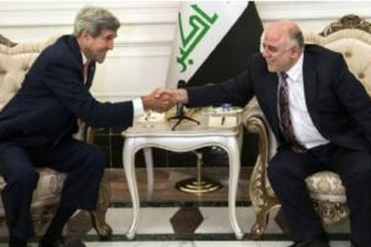 John Kerry dan PM Al-Abadi mengadakan pembicaraan di Baghdad.