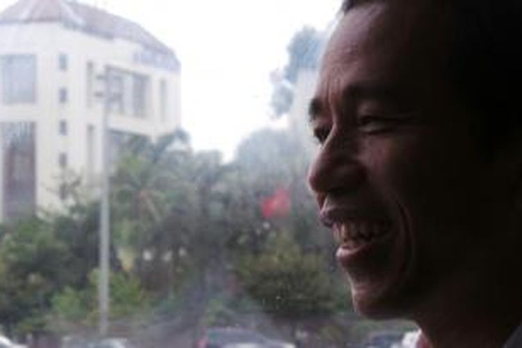 Gubernur DKI Jakarta Joko Widodo saat menikmati bus tingkat wisata, Kamis (16/1/2014).