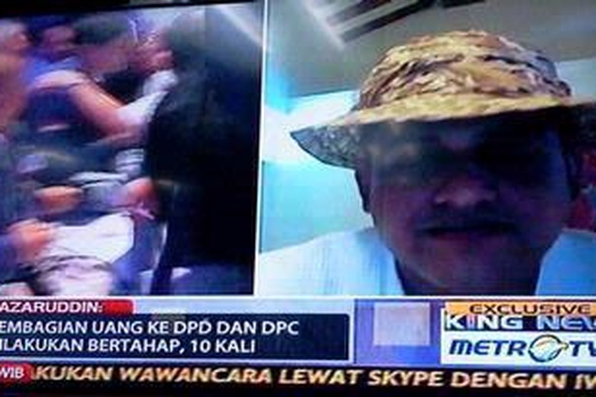 Former treasurer of ruling Democrat Nazaruddin is on television having an interview with the citizen journalist, Iwan Piliang, through Skype network on July 22, 2011