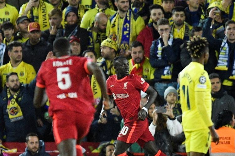 Striker Liverpool asal Senegal Sadio Mane melakukan selebrasi setelah mencetak gol kedua timnya ke gawang Villarreal, di Stadion Anfield, pada Kamis (28/4/2022) dini hari WIB.