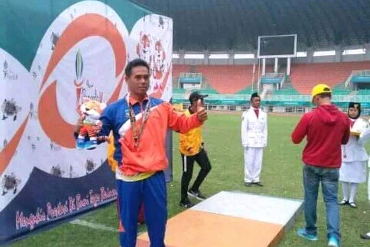 Atlet disabilitas, Rihan Firdaus, saat meraih perunggu dalam ajang Porda Jabar 2018 di Bogor. 