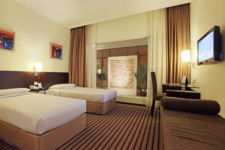 Kamar tipe superior di Harmoni One Convention Hotel and Service Apartments Batam.