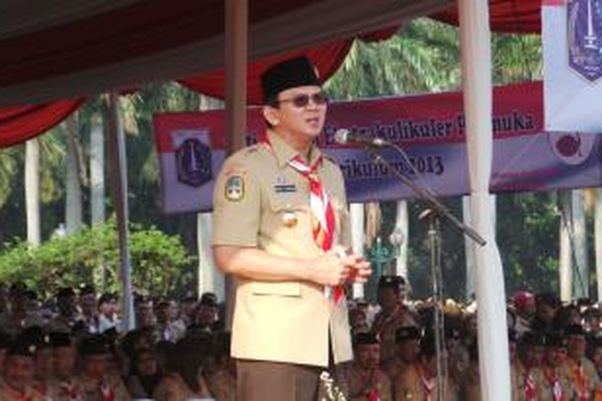 Wakil Gubernur DKI Jakarta Basuki Tjahaja Purnama saat menjadi Inspektur Upacara di Hari Pramuka ke-53, di Lapangan Silang Selatan Monas, Jakarta Pusat, Kamis (14/8/2014).