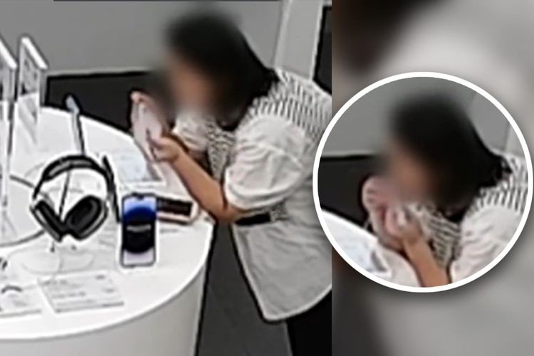 Seorang wanita yang terekam CCTV terlihat mencuri iPhone 14 Plus dengan cara mengigit kabel anti-maling