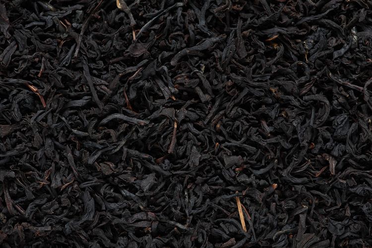 Ilustrasi black tea atau teh hitam untuk bahan membuat Thai tea. 