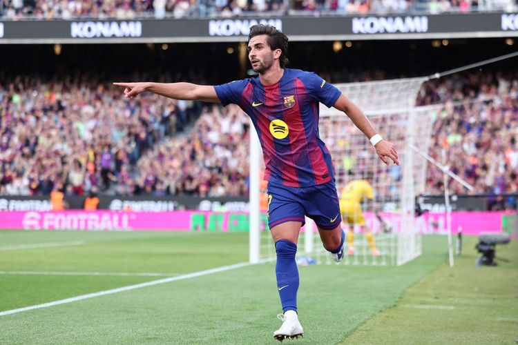 Ferran Torres merayakan gol kedua timnya dalam pertandingan sepak bola Liga Spanyol antara FC Barcelona vs Espanyol di Stadion Camp Nou di Barcelona pada 11 April 2026. (Foto oleh Josep LAGO / AFP)