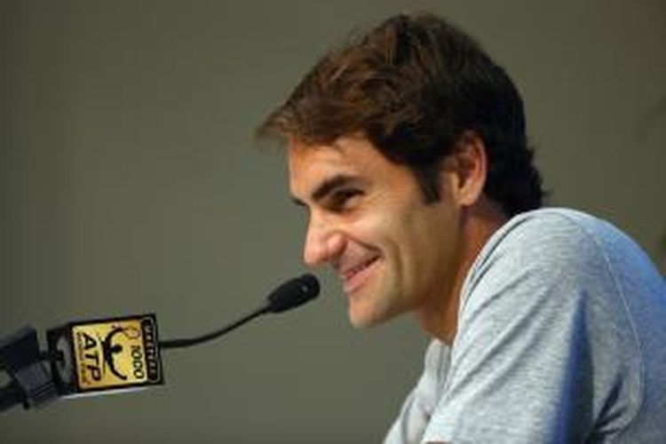 Petenis Swiss, Roger Federer, berbicara kepada media jelang turnamen Western & Southern Open di Lender Family Tennis Center, Cincinnati, Selasa (12/8/2014).