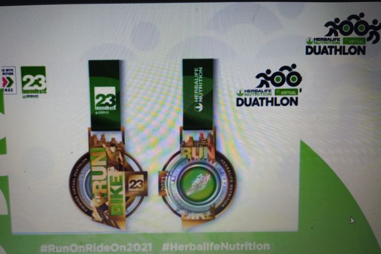 Tangkapan layar, menurut General Manajer Tribun EO Gunawan Samiadji, medali finisher Herbalife Nutrition Virtual Duathlon 2021 terbilang unik lantaran pada bagian medali ada bagian yang berputar dan di dalam lingkaran ada orang berlari dan bersepeda.
