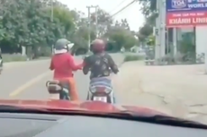 Hilangkan Budaya Ngobrol Sambil Naik Motor