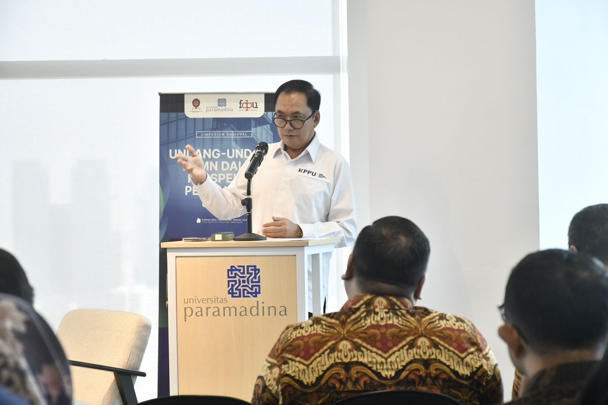 Ketua KPPU M Fanshurullah Asa saat membuka acara simposium nasional yang digelar Forum Dosen Persaingan Usaha (FDPU), Senin (30/6/2025).