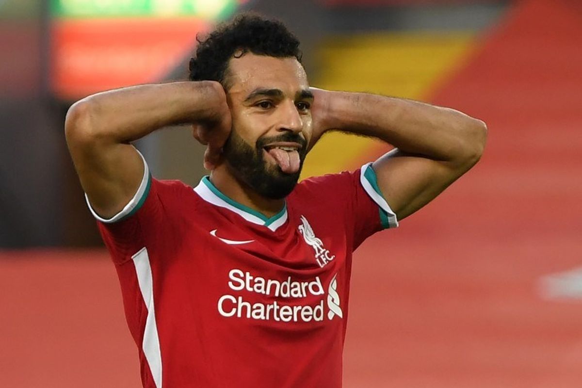 Perayaan gol Mohamed Salah setelah mencatatkan hat-trick pada laga Liverpool kontra Leeds, Sabtu (12/9/2020).