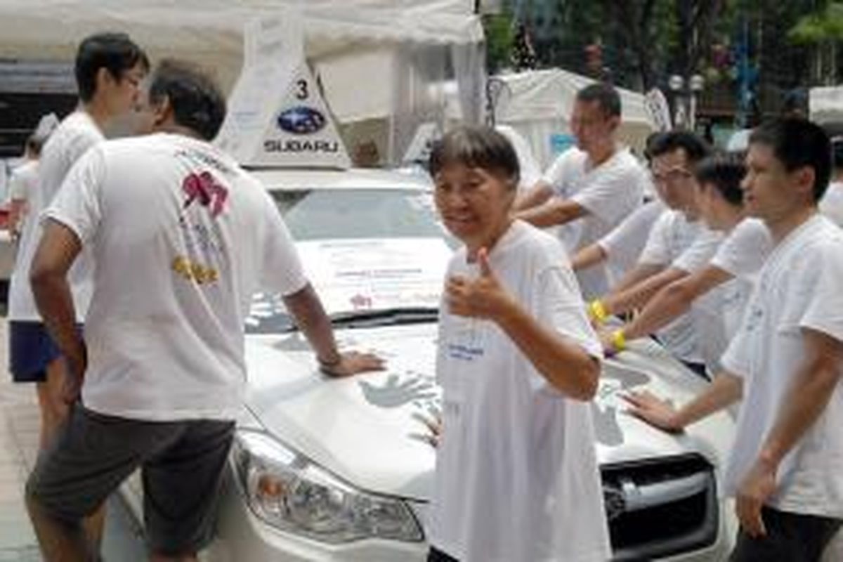 Vivien Tan, salah seorang peserta MediaCorp Subaru Challange 2014, adalah nenek berusia 70 tahun.