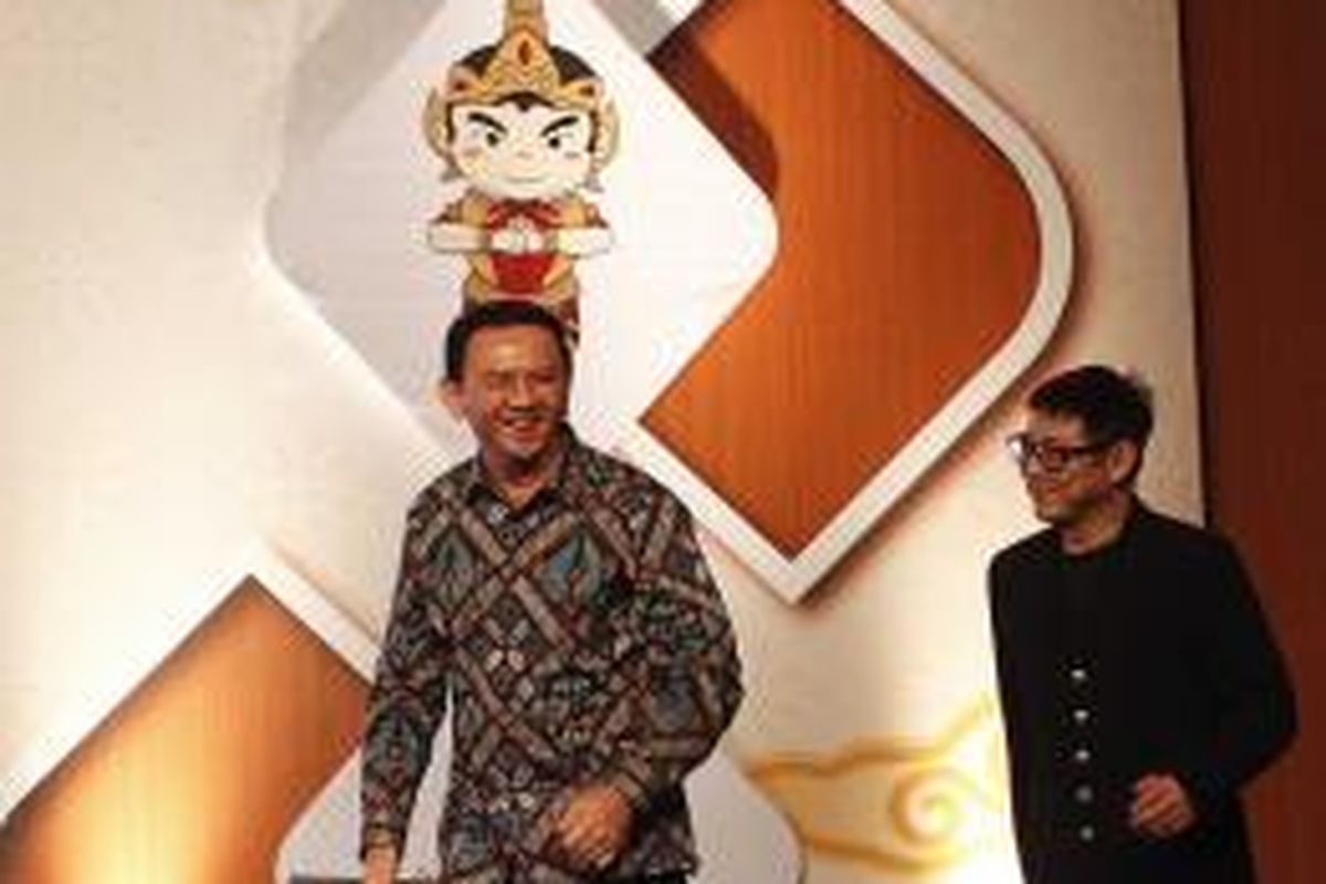 Gubernur DKI Basuki Tjahaja Purnama bersama Jet Li pada acara pembukaan Kejuaraan Dunia Wushu 2015, Jumat (13/11/2015). 