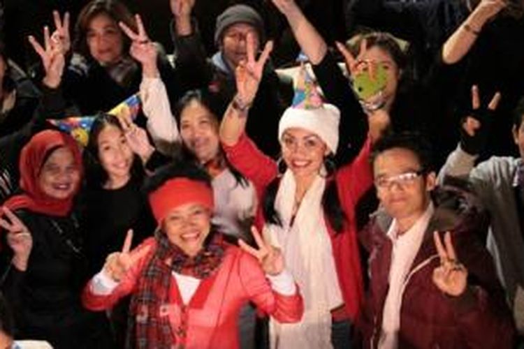 Warga Indonesia merayakan berakhirnya pilpres di sebuah cafe di Melbourne.