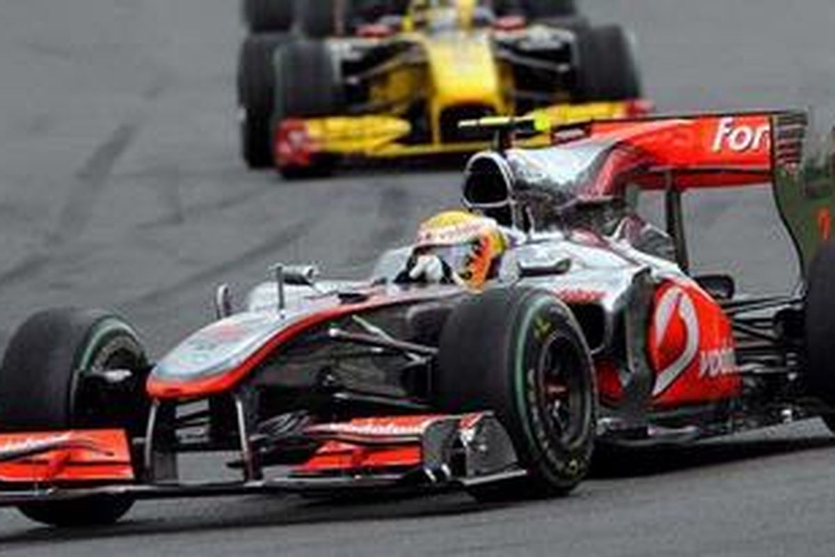 Lewis Hamilton, kembali ke puncak klasemen setelah memenangi GP Belgia, Minggu (29/8/10).