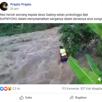 Tangkapan layar dari unggahan yang menampilkan seorang Kepala Desa di daerah Probolinggo saat menyelamatkan warganya karena terjebak banjir.